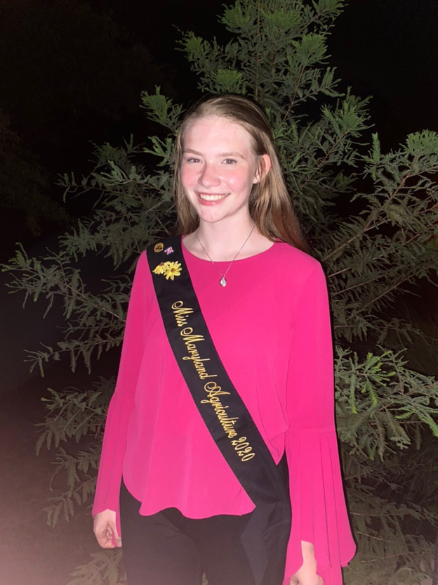 Keehan poses for a photo after winning the Miss Maryland Agriculture title. She competed in the event online.