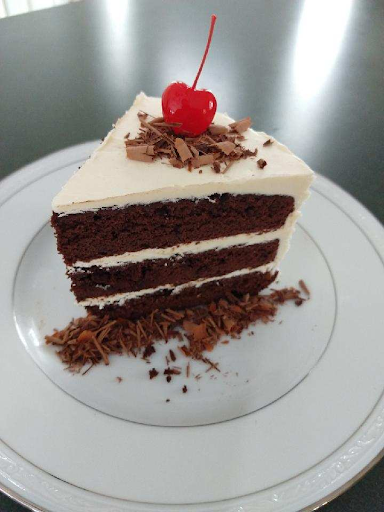 A chocolate-cherry cake named Black Forest baked by Ava BakerGirl. The company name was chosen because it was not taken on Facebook.