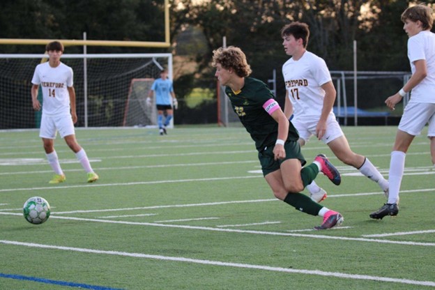 Senior Austin Smith looks to get possession of the ball in the Hereford game on 9/15. North Harford beat Hereford in this game 1-0. PHOTO CREDIT: Rachel Weston Sims 
