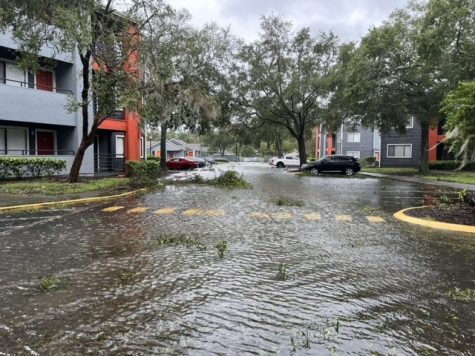 The flooded streets of Tori Hanna’s apartment complex hours after Ian hit. Many have their homes filled with water and some have no home at all. 
PHOTO CREDIT: Tori Hanna
