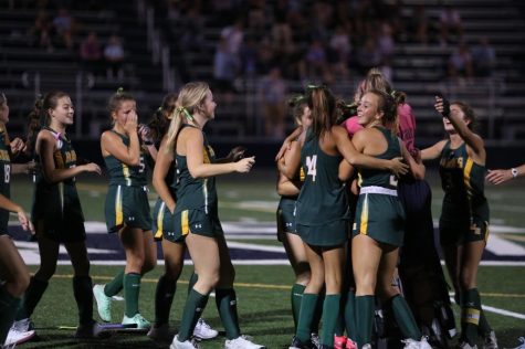 The field hockey team celebrates their 1-0 win against Bel Air in double overtime. This game made the girls 3-1. 