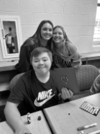 Juniors Julia Underwood and Maggie Dawson hang out with sophomore Michael Carico. At this meeting, students created Valentines Day cards.
Photo credit: Mrs. Stahl
